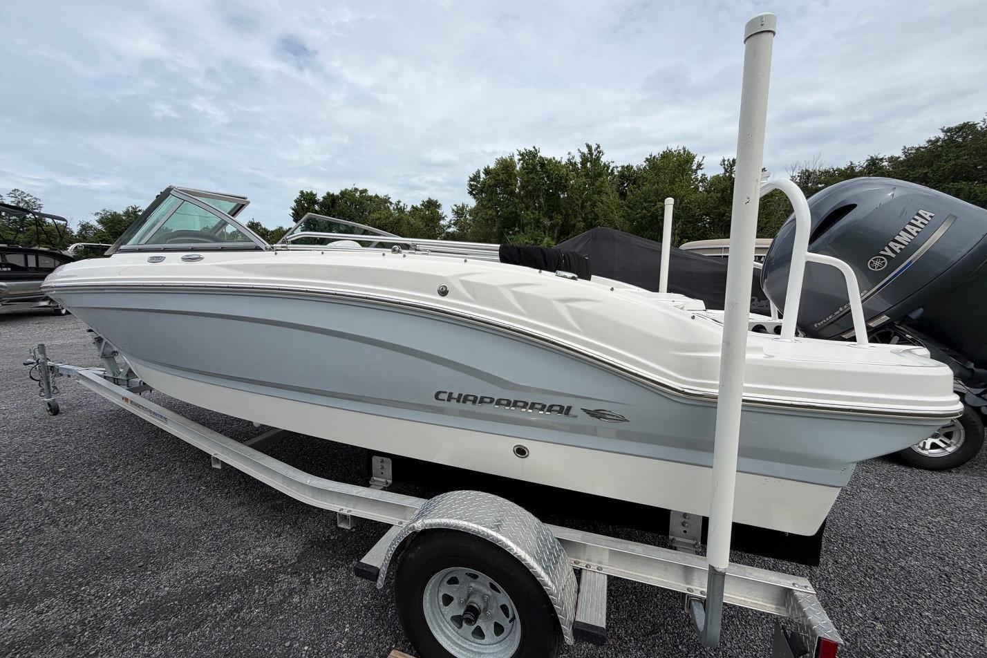 2020 Chaparral 196 SSi boat on trailer, parked outdoors with Yamaha engine visible.