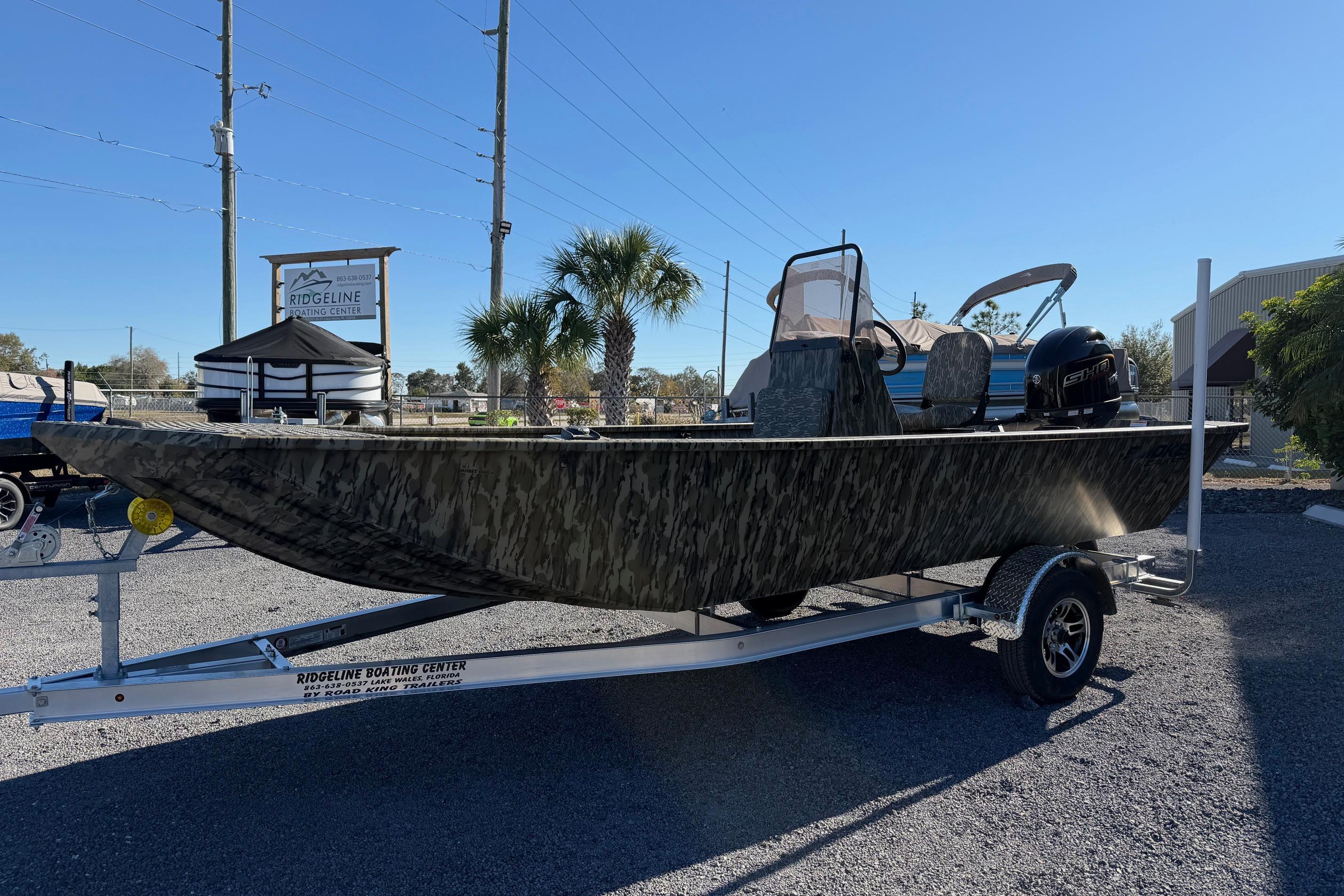 2026 Smoker Craft Sportsman 1866 boat on trailer at Ridgeline Boating Center.