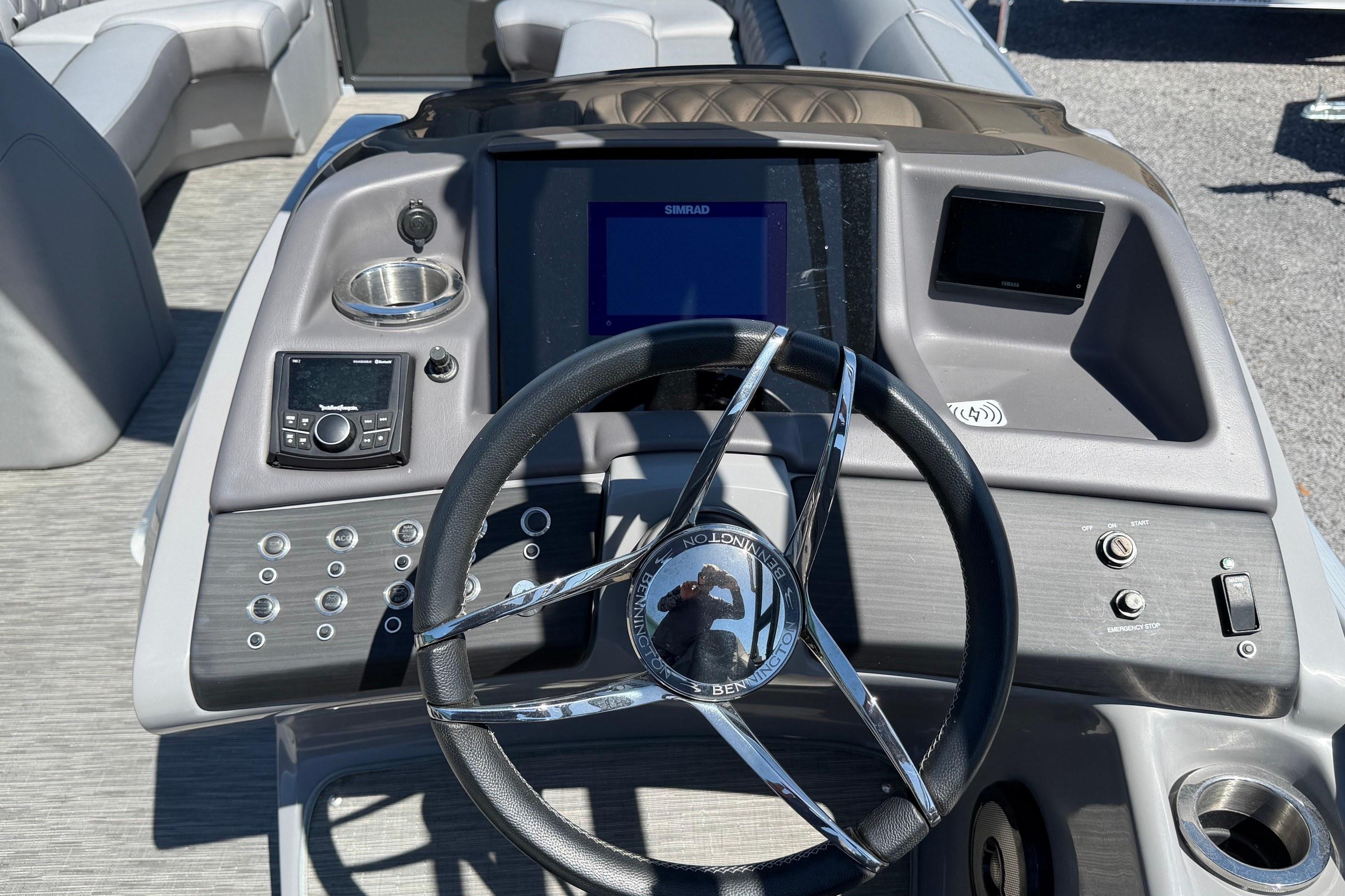 Steering console of 2022 Bennington 25 QX boat with modern controls and displays.