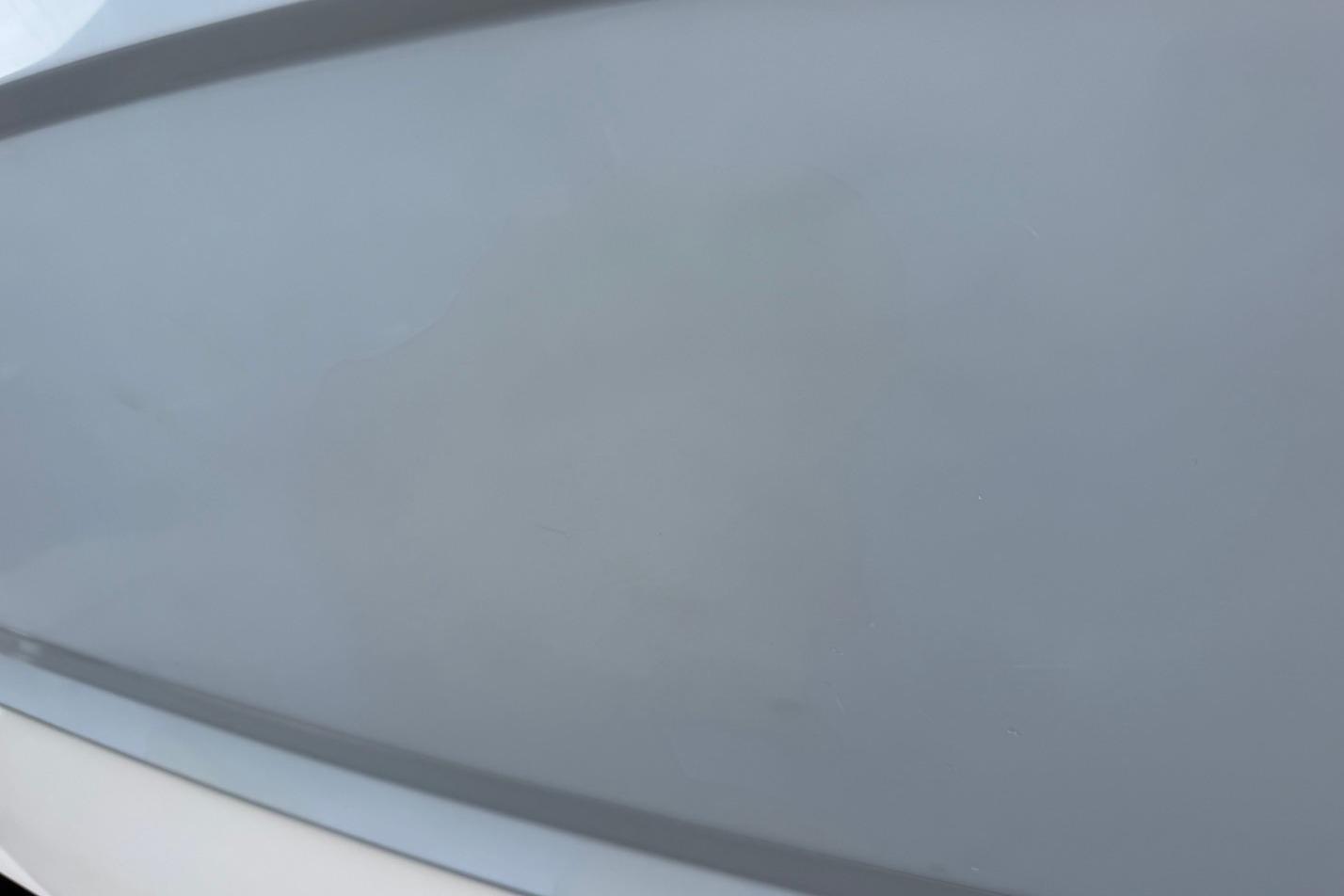 Close-up of a 2020 Chaparral 196 SSi boat hull in gray.